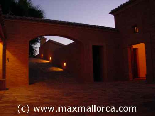 patio with entrance hall-tower by night.jpg